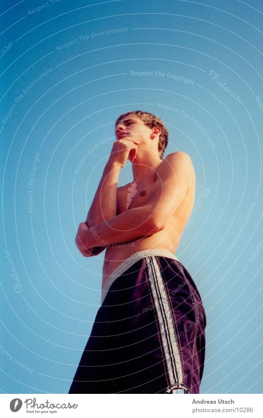 thoughtful1 Surfer Ocean Beach Vacation & Travel Think Upper body Swimming trunks Posture Style Man Human being ponder Blue