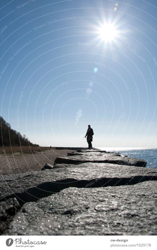 A young person on the beach of Hiddensee in bright sunshine persons Beach Beach dune Sunlight Sunbeam Silhouette Summer vacation Vacation & Travel Exterior shot