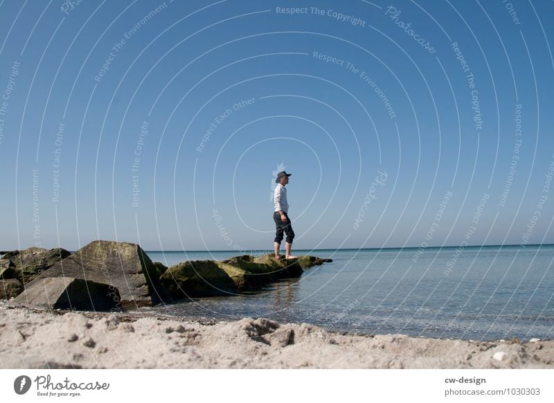 Young man on the beach of Hiddensee Man Lake Beach Blue