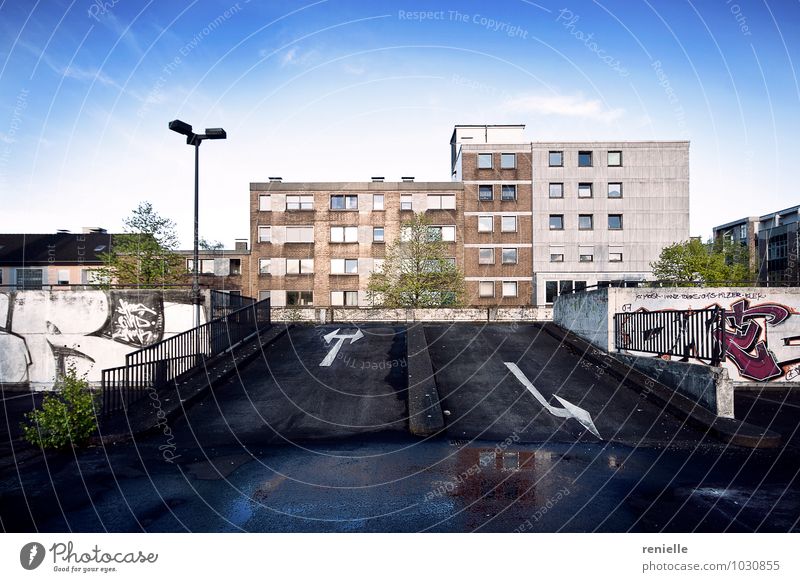 parking deck Work of art Youth culture Town Outskirts Deserted Parking garage Terrace Roof Graffiti Discover Hang Poverty Blue Gray Pink Optimism Success