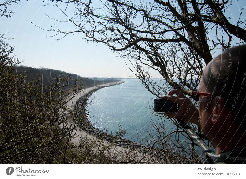 Man with camera on the beach of Hiddensee Beach Vantage point