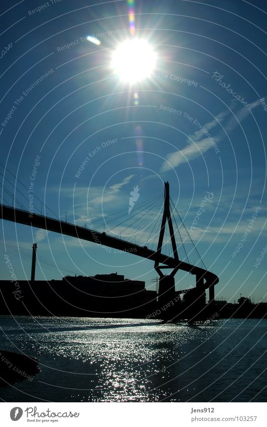 köhlbrand bridge Kohlbrand bridge Sunbeam Back-light Clouds Pol-filter Reflection Calm Bridge Harbour Hamburg Lens flare Sky Blue Shadow Water Silhouette Elbe