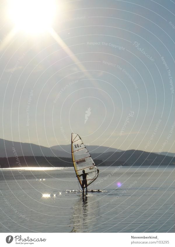 without wind. Surfer Slowly Surfing Brilliant Sunbeam Lake Ocean Reflection Water reflection Gray Aquatics Exterior shot Landscape Bright Mountain