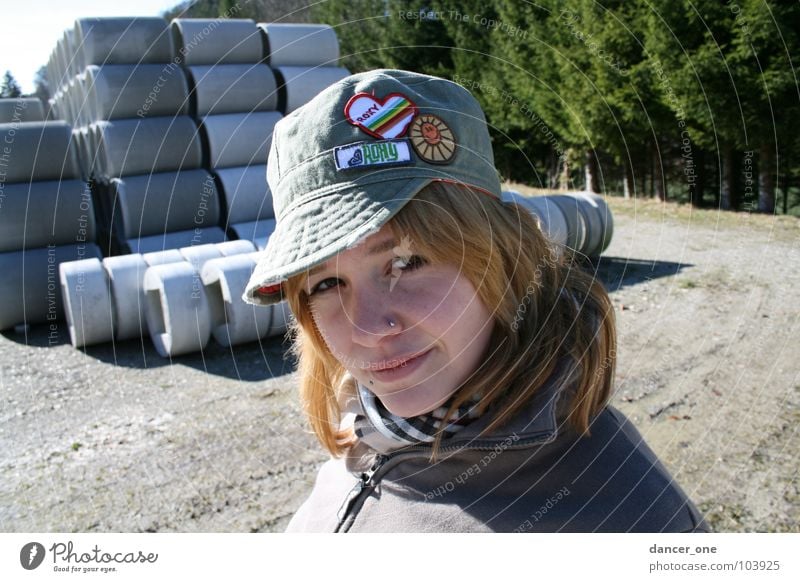 construction site Construction site Concrete Woman Tree Baseball cap Scarf Gravel Industry