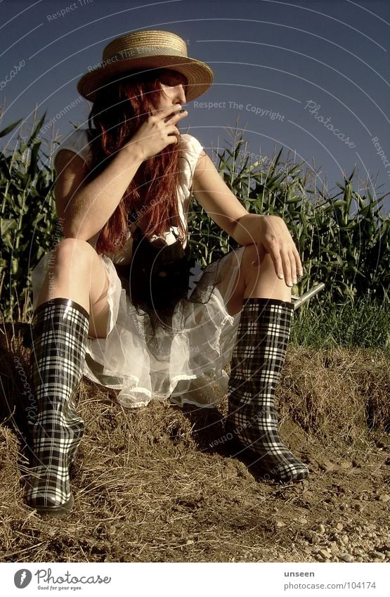 Done Maize field Green Foliage plant Rubber boots Woman Futile Dress Red Boredom grass? Nature Sky Blue Perspective Hair and hairstyles Hat