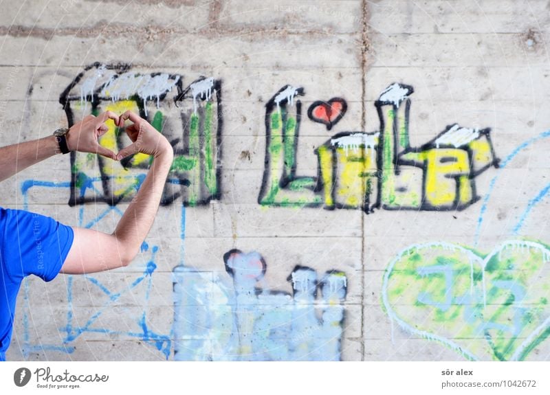 young man in love forms a heart with his hands Human being Masculine Young man Youth (Young adults) Man Adults Life Hand Fingers 1 30 - 45 years Wall (barrier)