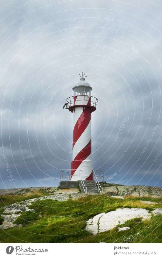 lighthouse Environment Nature Landscape Water Beautiful weather Coast Ocean Atlantic Ocean Dangerous Lighthouse Reddish white Colour photo Exterior shot Day