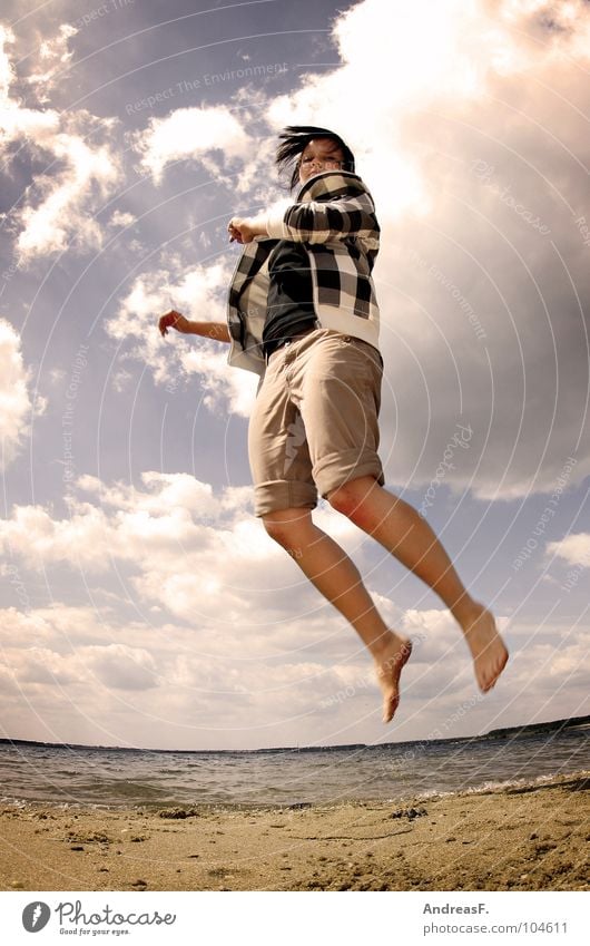 Say hello to the sun! Beach Lake Sandy beach To go for a walk Walk on the beach Summer Vacation & Travel Wet Pebble Clouds Summery Physics Cooling Woman