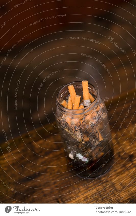 daughter's ashtray on the veranda Smoking Dirty Disgust To enjoy Healthy Health care Boredom Stress Addiction Cigarette Butt Glass Colour photo Subdued colour