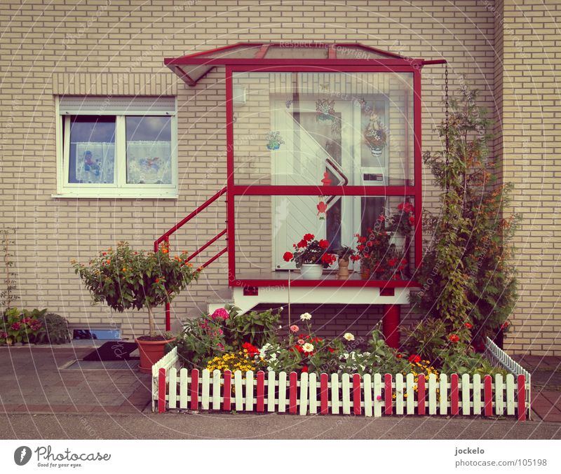 private House (Residential Structure) Front garden Entrance Door Red Swabian Fence Garden fence White Reddish white Bushes Petit bourgeois Town Colour error