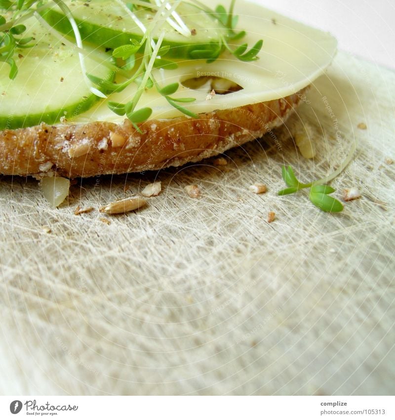 breakfast Bread Chopping board Wooden board Dinner Breakfast Cress Grain Whole grain bread Fiber Cheese Gouda Herbs and spices Kitchen Fresh Healthy