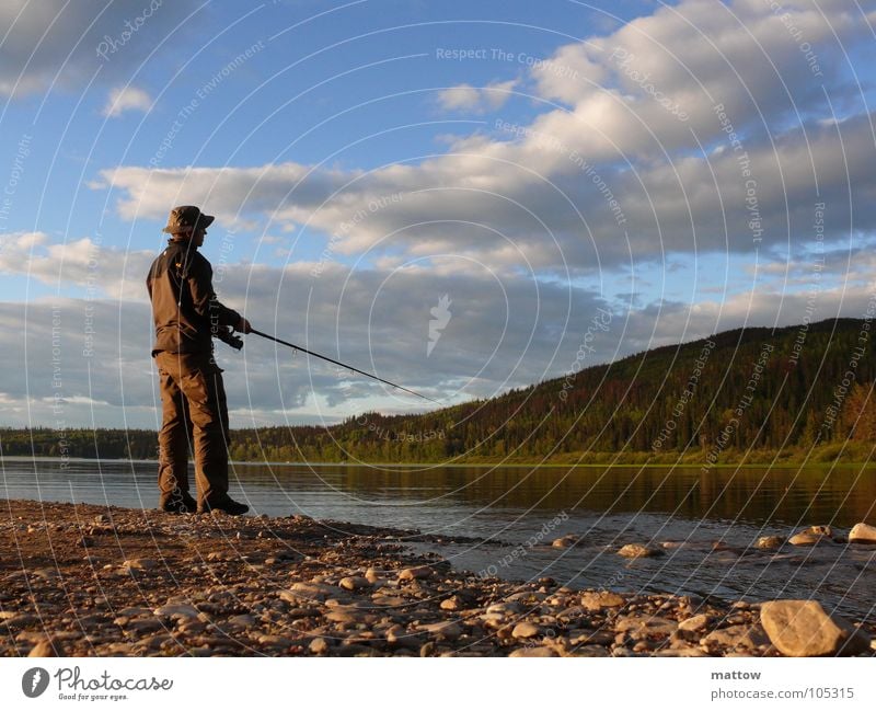 big fish Fishing rod Fishing (Angle) Lake Sunset String Nutrition Beach Gravel Leisure and hobbies Water Nature Food Coast