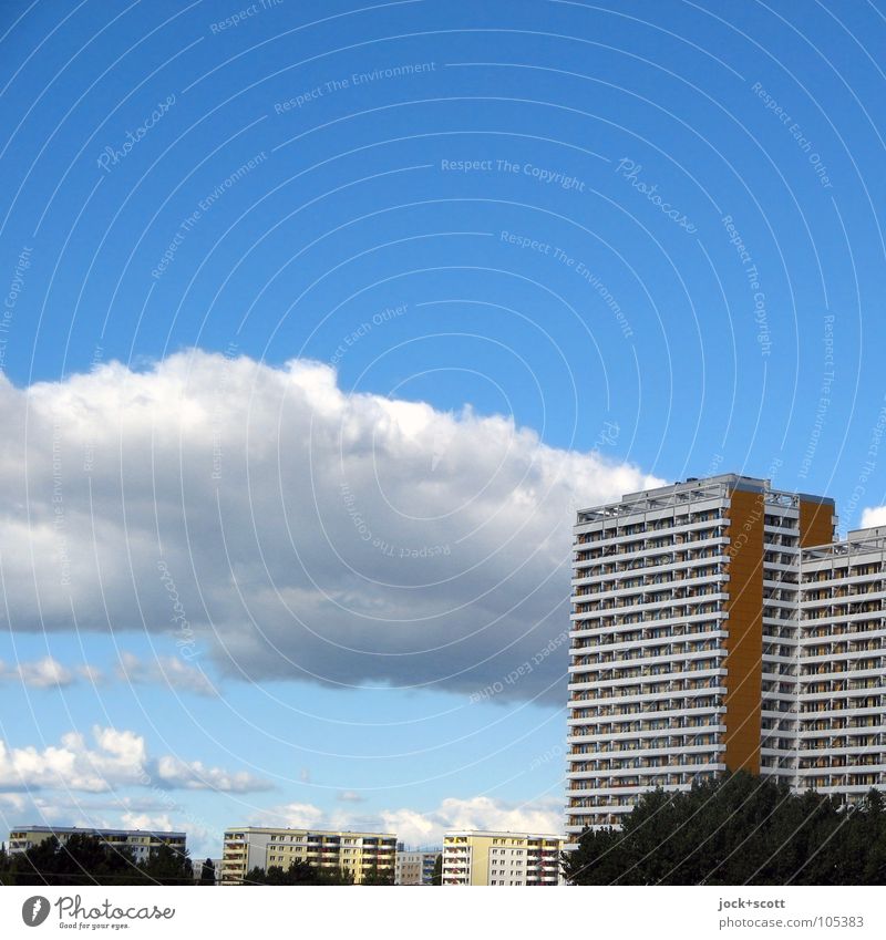 Panel construction Clouds spring Marzahn Outskirts Prefab construction Town house (City: Block of flats) Facade Authentic Sharp-edged Hideous Tall Modern Blue