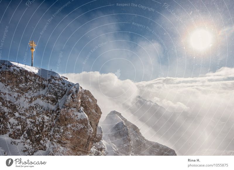 cross Environment Landscape Sky Clouds Sun Winter Beautiful weather Alps Mountain Snowcapped peak Cold Zugspitze Peak cross Snowfall Lighting Colour photo