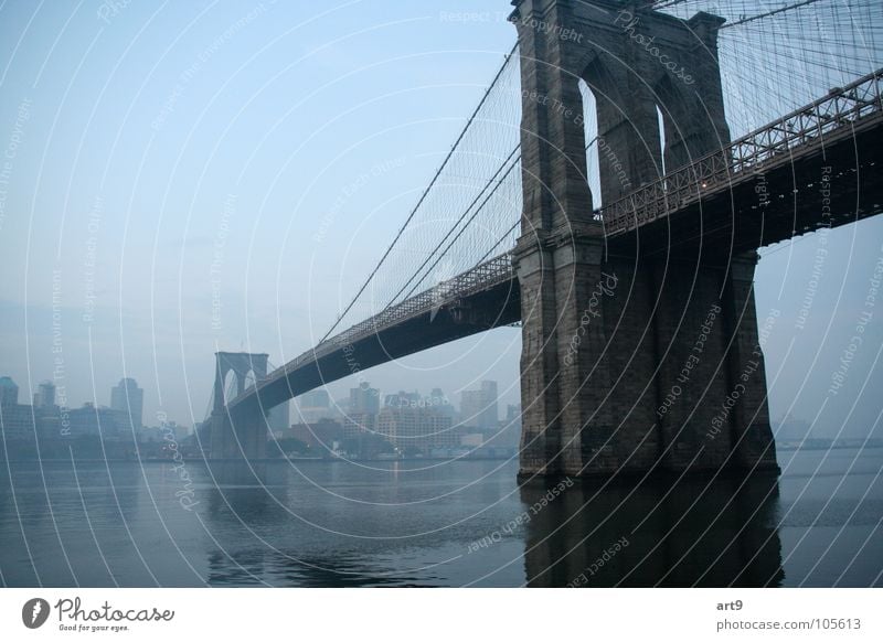 Brooklyn Bridge in the morning Stone bridge Suspension bridge Romance New York City Morning fog Exterior shot Historic River Water Sadness Architecture