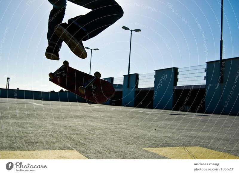 Kickflip - Yeah Right Style Skateboarding Jump Air Athlete Salto Parking garage Lamp Yellow Sky Rotation Rotate Action Fitness Above up lamps Legs leg Blue turn