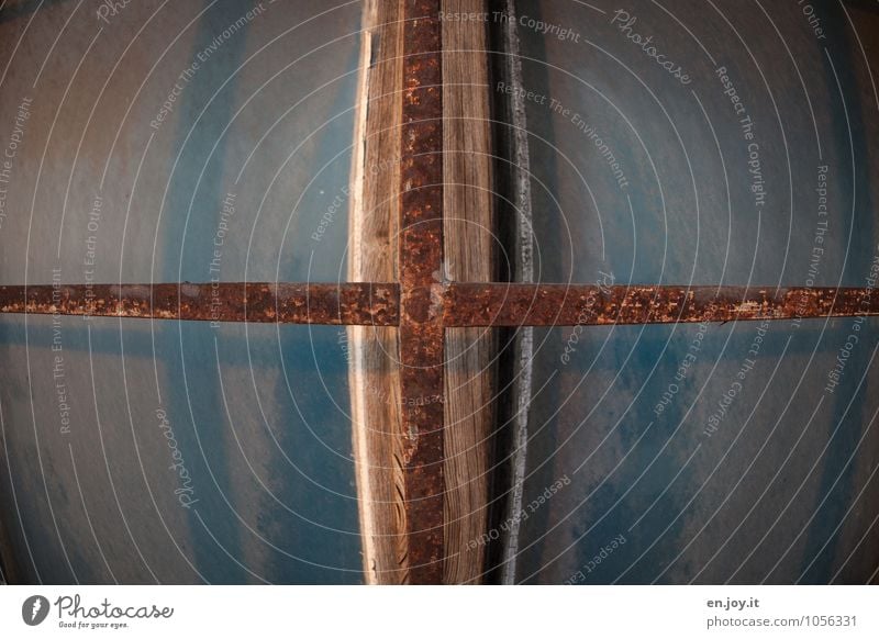 claustrophobia Construction site Window Window frame Window transom and mullion Window pane Rust Crucifix Old Dirty Sharp-edged Hideous Blue Brown Dream Sadness