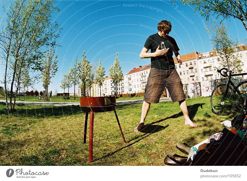 BBQ Ninja Colour photo Exterior shot Copy Space left Copy Space top Day Sunlight Fisheye Full-length Downward Picnic Summer Gastronomy Human being Masculine Man