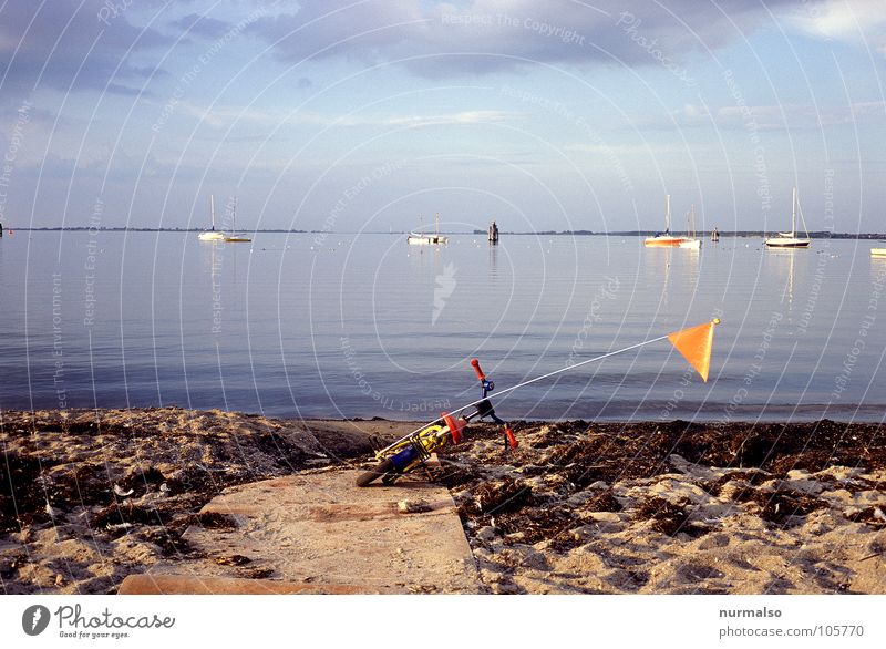 descended . . . Far-off places Beach Flag Moody Watercraft Ocean Algae Bicycle Kiddy bike Summer Blue Evening gone Baltic Sea Lanes & trails End Tracks