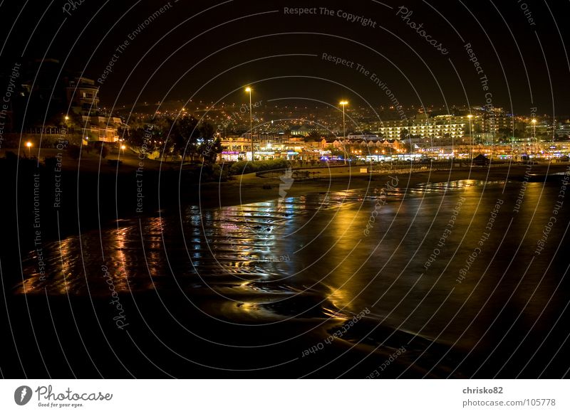 sea of light Vacation & Travel Spain Canaries Tenerife Beach Ocean Promenade Waves Multicoloured Night Panorama (View) Coast South Atlantic Ocean Evening