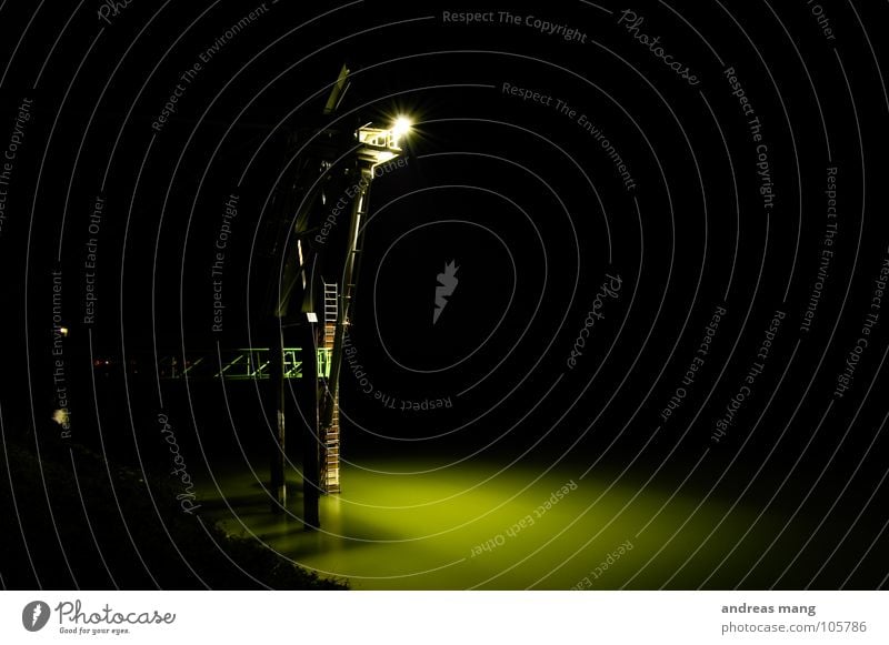 A long way up Dark Light Night Industrial Photography Steel construction Lamp Green Calm Flow Platform Industry Floodlight Lighting Water River Ladder Climbing