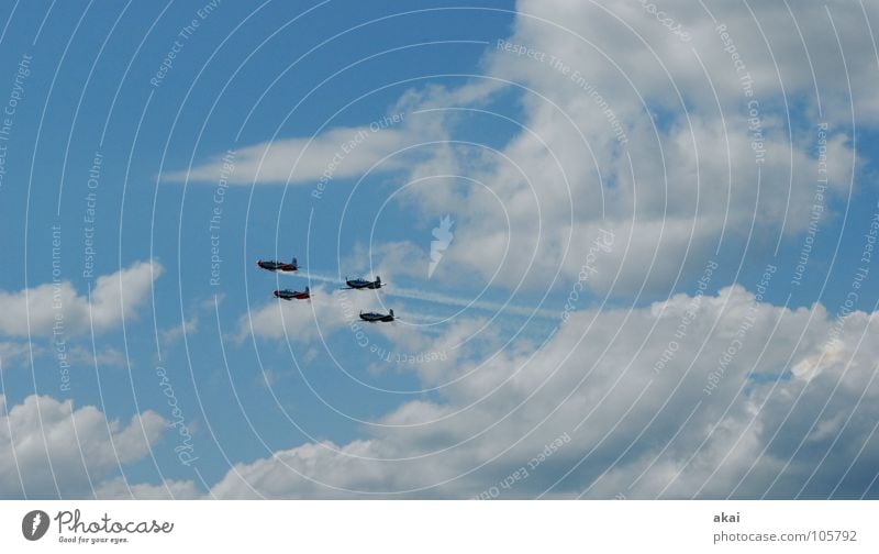 FLYING BOARD Airplane Second World War Army Warped Airfield Jubilee Air show Event Action Airplane race Sporting event Clouds Smoke Sky blue Joy Concentrate