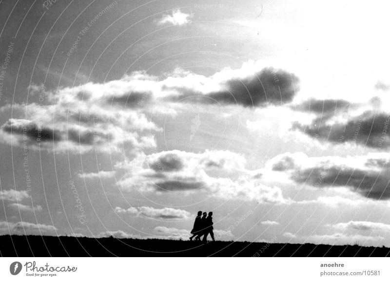 Three on the dike 3 Dike Clouds Friendship Back-light Group Wind North Sea