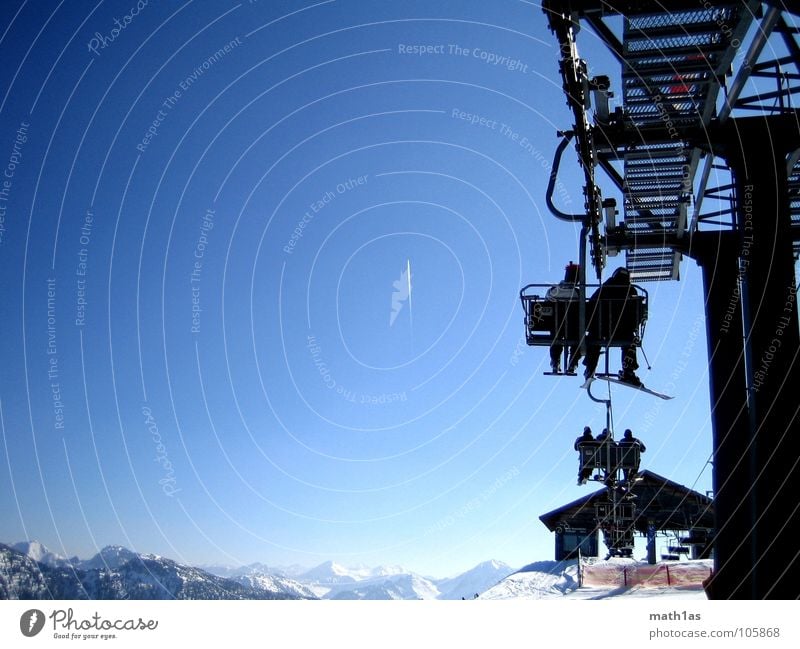 hover towards the summit Skis Chair lift Prop Peak Winter Cold Ferris wheel Mountain Snow Ski lift Upward Vapor trail Aviation Pole Snowcapped peak Ski resort