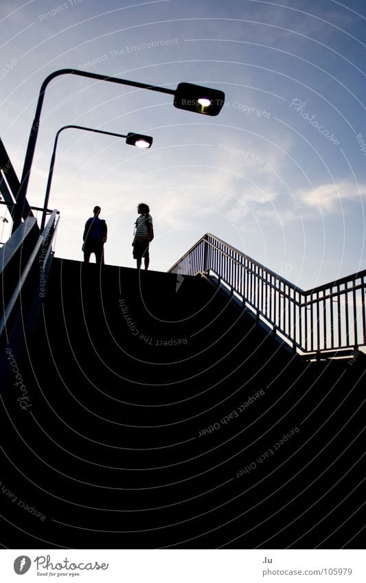 two (1/3) Go up Friendship Back-light Silhouette Lamp Man Direction Street lighting Dark Stand Tread 2 Joy Youth (Young adults) Movement To fall Handrail Sky