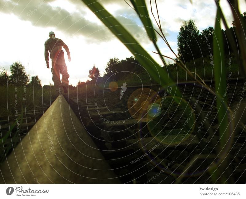 Towards the sun... Railroad tracks Means of transport Commuter Air Breathe Inhale Masculine Where Territory Photo shoot Media Media design Design