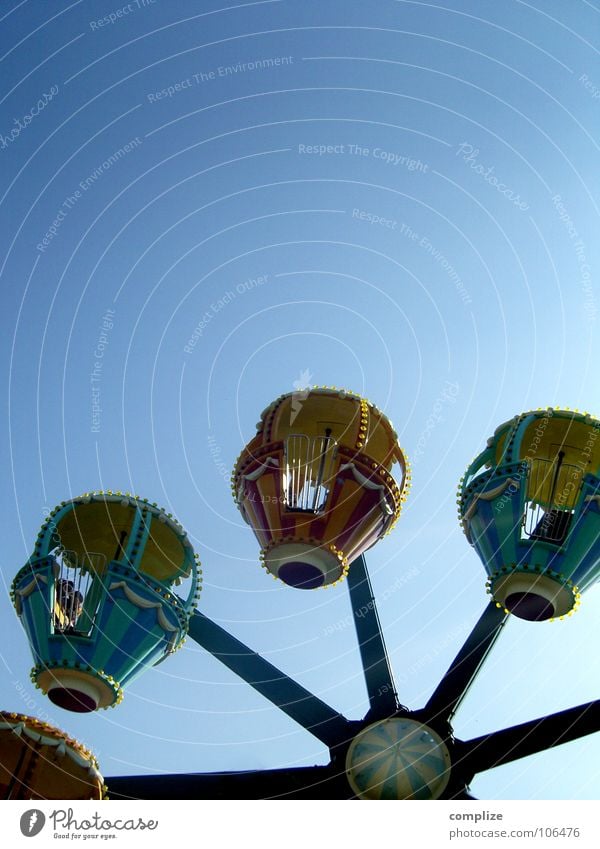 roundabout Fairs & Carnivals Carousel Amusement Park Ferris wheel Playing Driving Attraction Theme-park rides Round Joy Sky Blue phanstasia Flying Circle