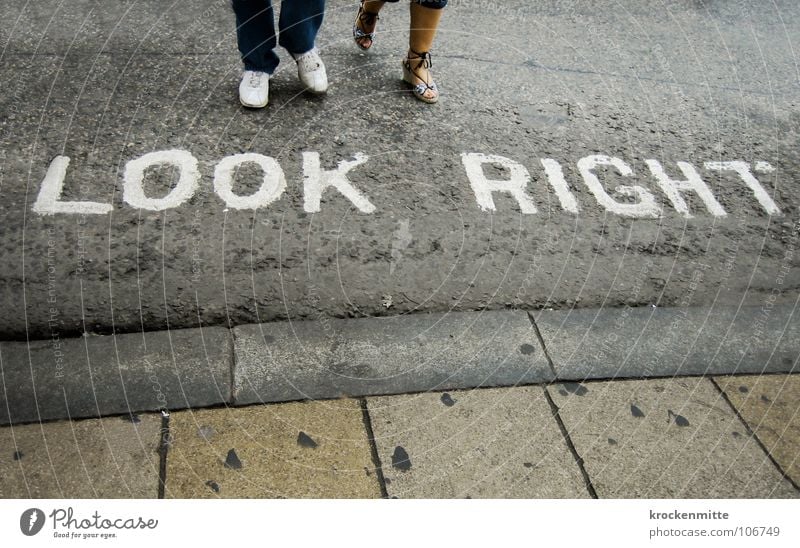 The right look Traverse Pedestrian Street crossing London England Typography Town Asphalt Footwear Transport Vacation & Travel Great Britain Left-hand traffic