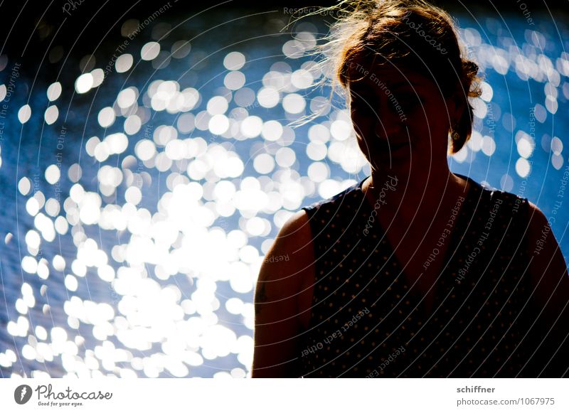 Silhouette of a woman in front of glittering water Human being Feminine Young woman Youth (Young adults) Head Hair and hairstyles 1 Sunlight Pond Lake Blue