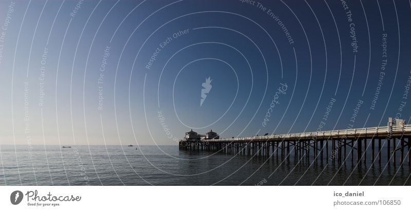 Malibu Beach Vacation & Travel Ocean Water Beautiful weather Positive Blue Sea bridge Pacific Ocean California USA Blue sky Horizon Central perspective