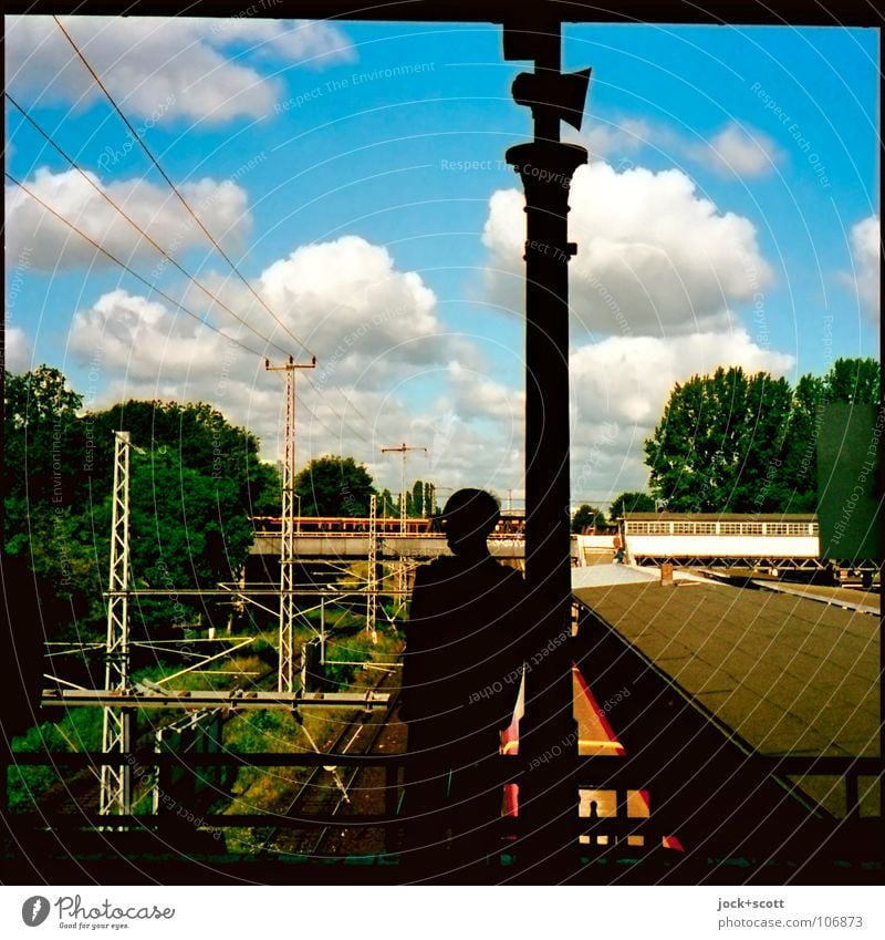 Ostkreuz as it used to be Loudspeaker Human being 1 Clouds Friedrichshain Train station Column Public transit Commuter trains Platform Railroad tracks