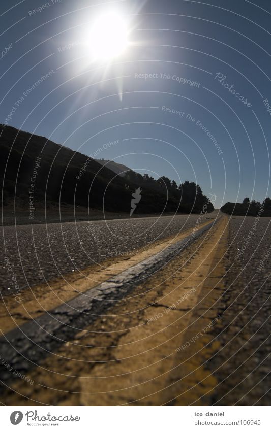 Pacific Highway I Sun Sky Cloudless sky Street Line Stripe Bright Blue Yellow Gray California Asphalt USA Colour photo Exterior shot Sunlight Sunbeam Back-light