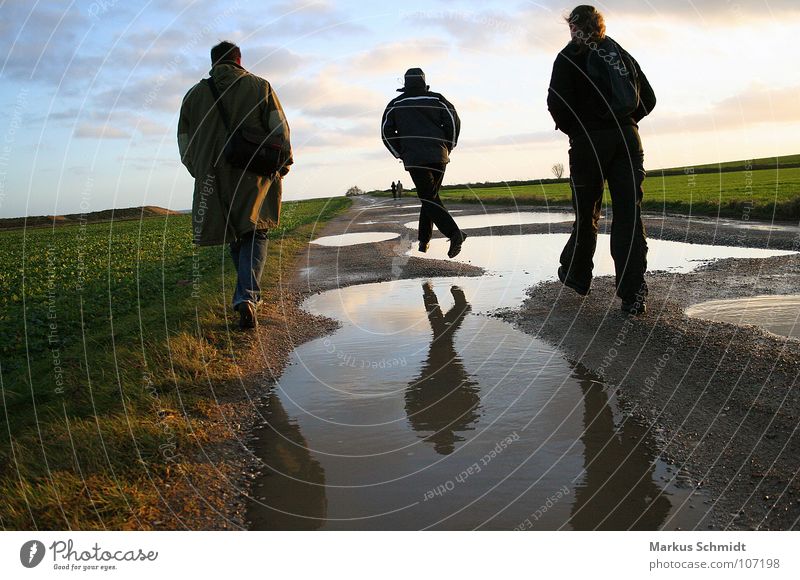 Jump! Friendship Evening sun Winter Joy Beach Coast To go for a walk Water Baltic coast light-footed Denmark