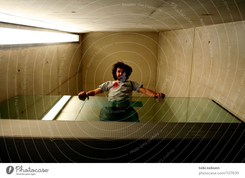 looking down Hell Light Skylight Concrete Wall (building) Portrait photograph Man Keen insight Black Gray Mysterious One-way street Shaft Gallery Valencia