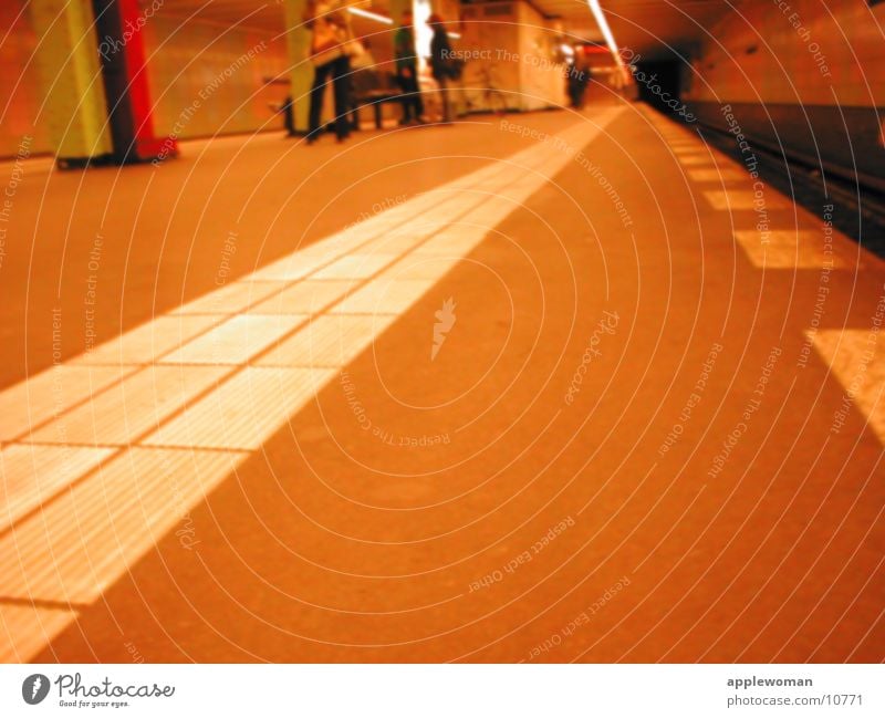 berlin_underground Underground Platform Worm's-eye view Edge Railroad tracks Architecture Berlin Evening Floor covering flow over the ground Orange