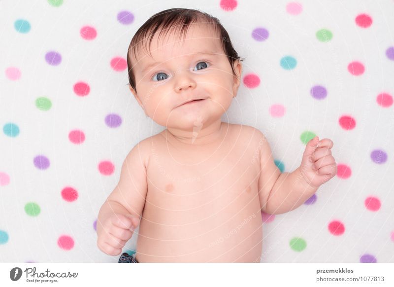 Little baby girl lying on blanket with colourful polka dots Beautiful Child Human being Baby Girl Infancy 0 - 12 months Smiling Small Cute Soft Pure Innocent