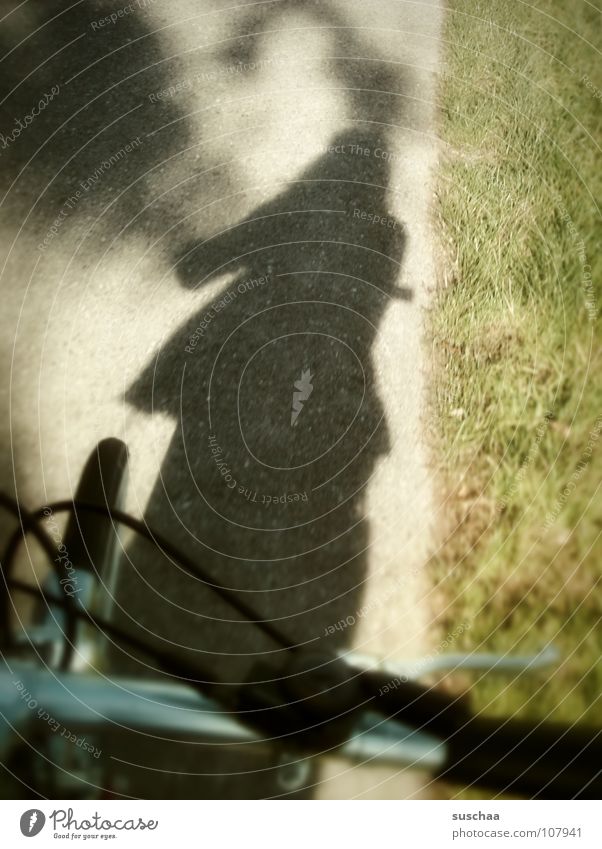 ... another shadow-wheeler ... Drop shadow Bicycle Asphalt Wayside Grass Green Take a photo Leisure and hobbies Shadow Brakes Bicycle handlebars metal bar