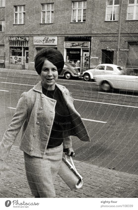 mama, who is having a rabble-rousing effect on the photographer. Sixties Black White Retro Hair and hairstyles Brunette Snapshot Pedestrian Black & white photo