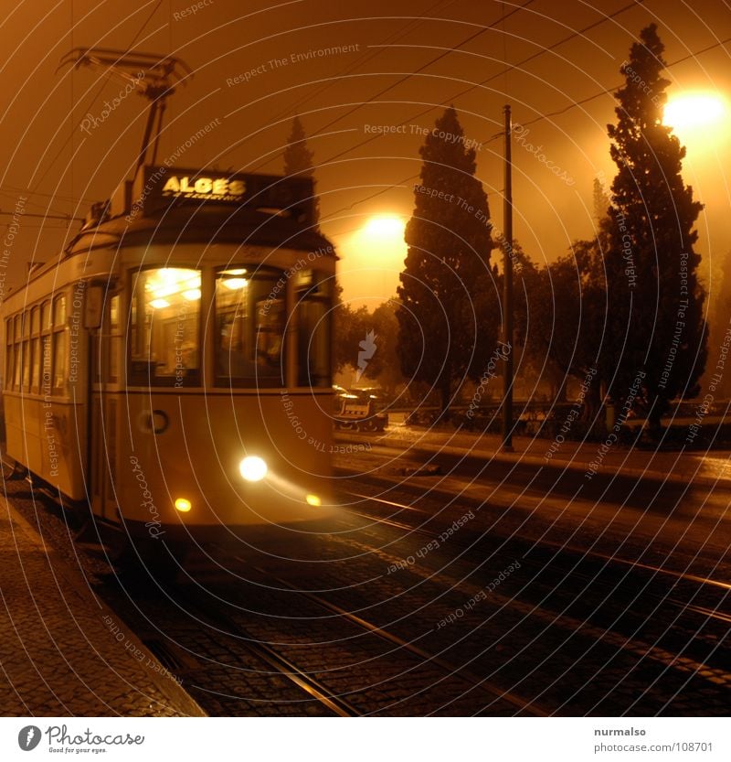 Night and fog Tram London Fog Lisbon Narrow-gauge railroad Eerie Electric Autumn Creepy Light Railroad tracks yellow mood Movement Evening Morning Fear