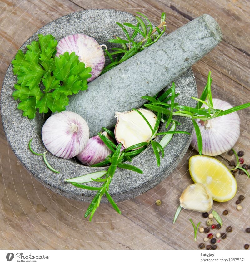 Herbs in a mortar Garlic Clove of garlic Rosemary Mortar Cooking Lemon Aromatic Food Healthy Eating Dish Food photograph Fresh Herbs and spices Green Pepper