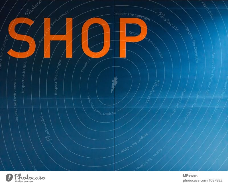 shop Sign Characters Signs and labeling Signage Warning sign Blue Orange Store premises Colour photo Interior shot Deserted Copy Space right Copy Space bottom