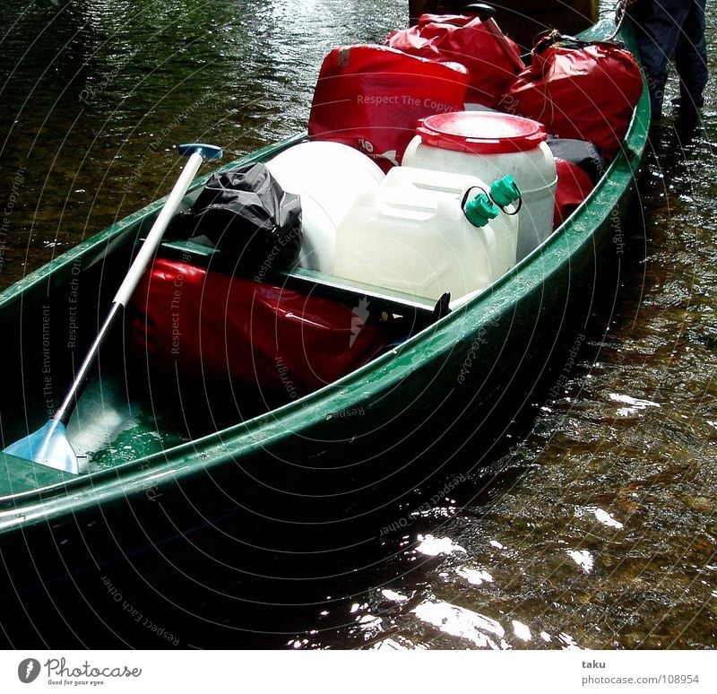 WHO LOVES HIS CANOE, PUSHES. June Canoe trip Work and employment Paddle Water can Life jacket Rain jacket Push Effort String Aquatics Poland Masuria packsacks