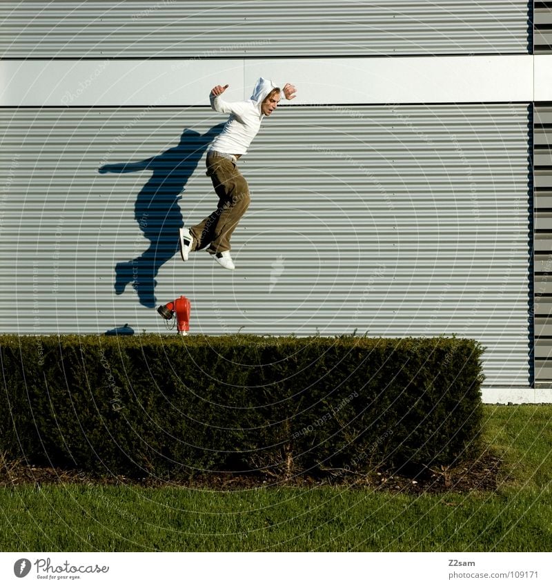 descent Dangerous To fall Beginning Bushes Direct White Fire hydrant Red Adjustment Jump Action Hop Easygoing Youth (Young adults) Edge Hedge Green Pattern