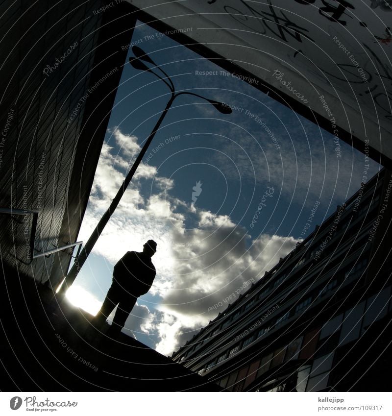 n Tunnel Man Alexanderplatz Pedestrian Curiosity Looking Prefab construction Lamp Lantern Street lighting Town East Berlin Clouds Back-light Stand Window Shaft