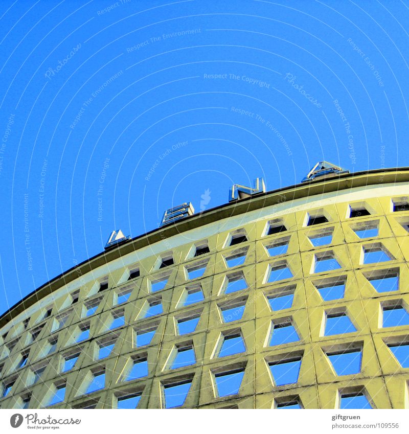 hole(s)-in-the-wall Facade House (Residential Structure) Building Hollow Rectangle Inscription Neon light Letters (alphabet) Sky blue Wall (barrier) Vista