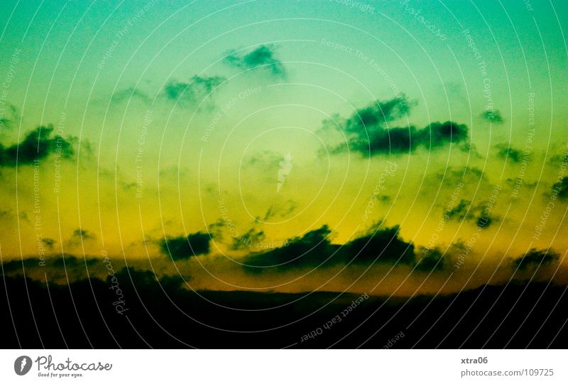 green-yellow sky in landscape format Green Yellow Clouds Night Sunset Sky Mountain Evening